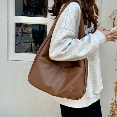 Vielseitige Vegan-Ledertasche für Damen