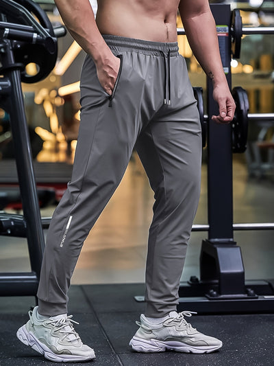 FlexJog™ – Atmungsaktive Herren Sporthose mit Reißverschlusstaschen