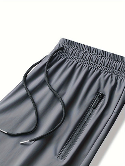 FlexJog™ – Atmungsaktive Herren Sporthose mit Reißverschlusstaschen