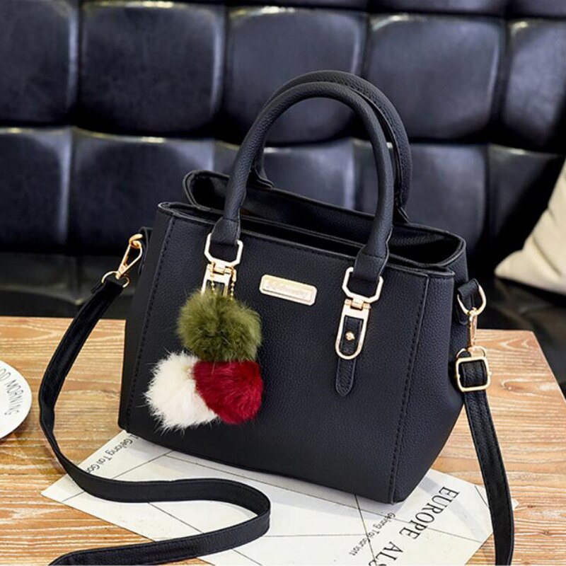 Elegante Damen-Lederhandtasche mit 3 modischen Plüschbällen