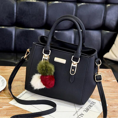 Elegante Damen-Lederhandtasche mit 3 modischen Plüschbällen