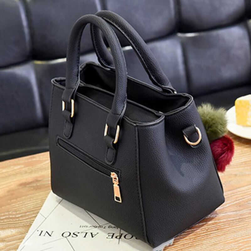 Elegante Damen-Lederhandtasche mit 3 modischen Plüschbällen