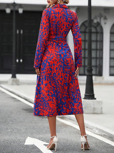 Virella – Elegantes Knoopkleid mit langen Ärmeln und Allover-Druck